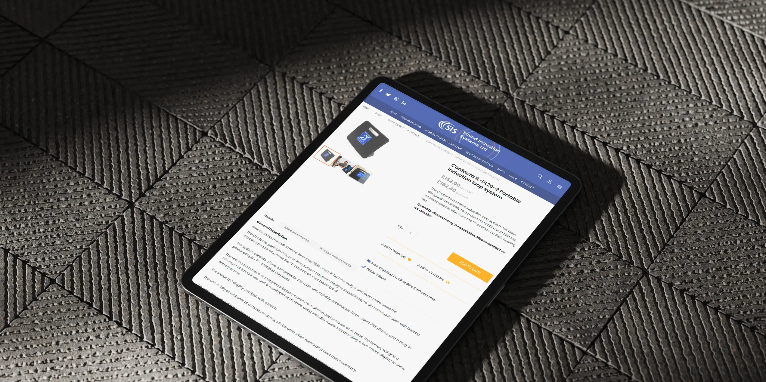 An iPad on a grey soundproof surface showing the product page from the Sound Inductions website